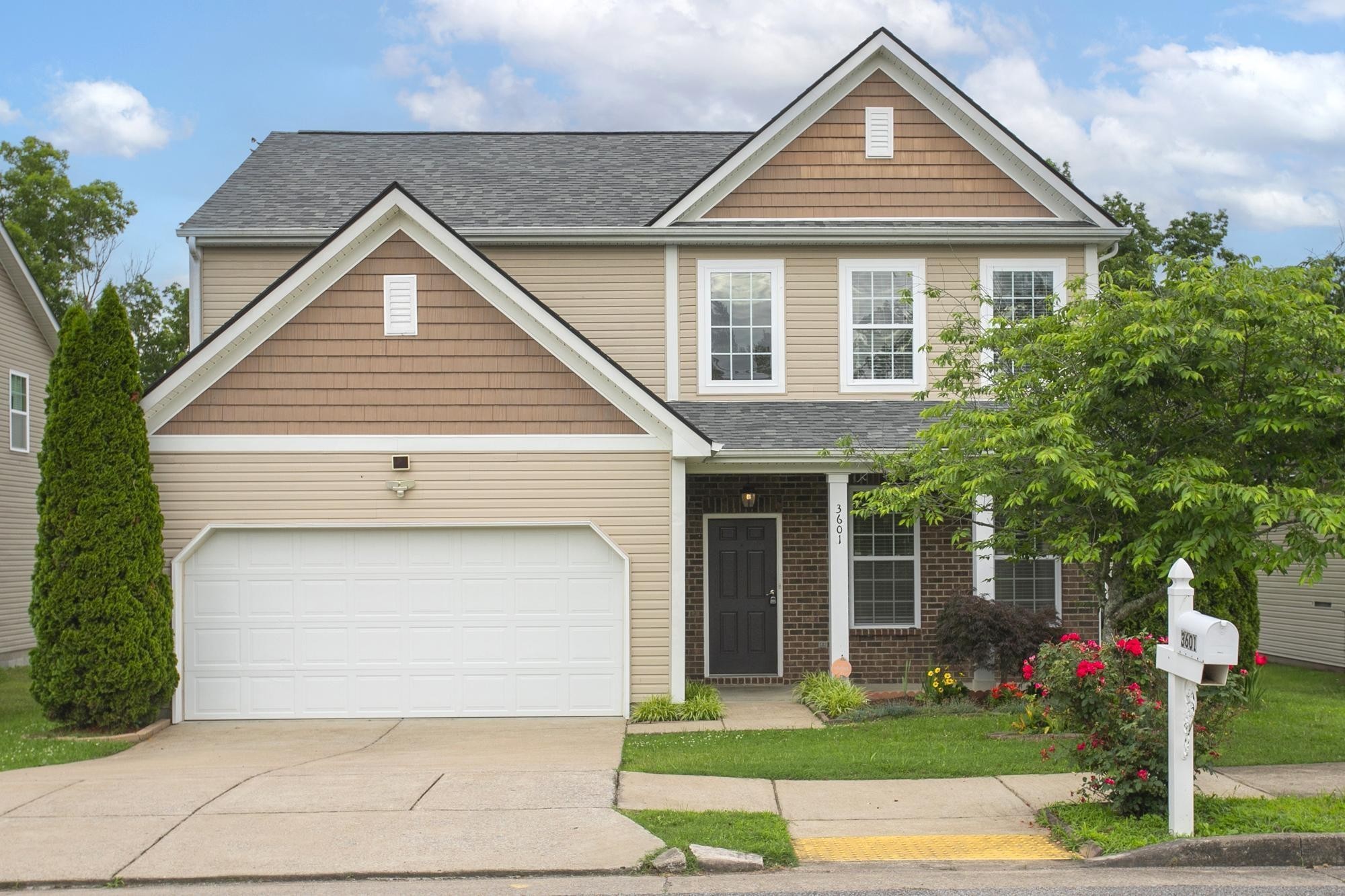 3601 Harpeth Springs Drive Nashville, TN 37221 - Photo 1 of 55 a front view of a house with a yard