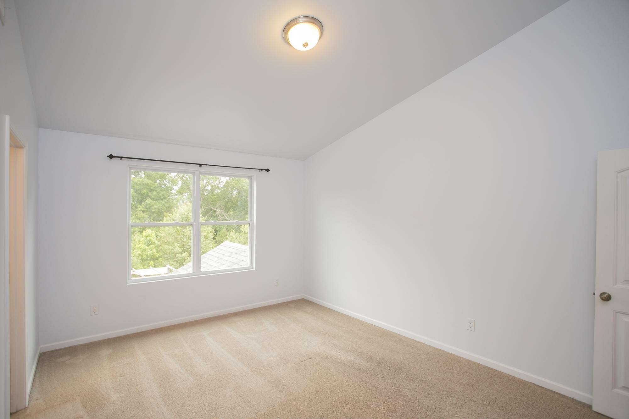3601 Harpeth Springs Drive Nashville, TN 37221 - Photo 28 of 55 an empty room with windows