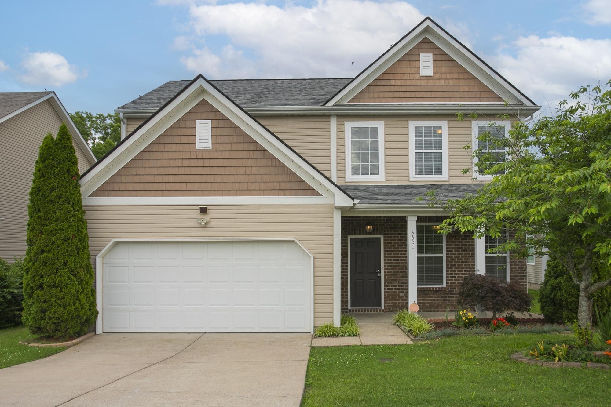 3601 Harpeth Springs Drive Nashville, TN 37221 - Photo 3 of 55 front view of a house with a yard