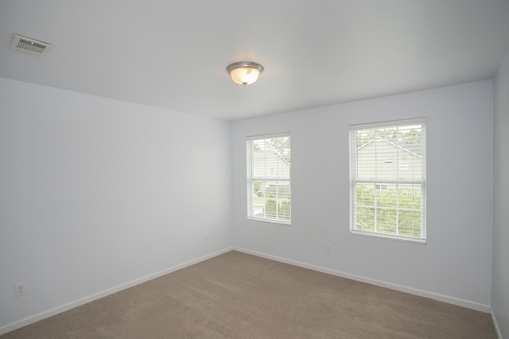 3601 Harpeth Springs Drive Nashville, TN 37221 - Photo 32 of 55 an empty room with windows