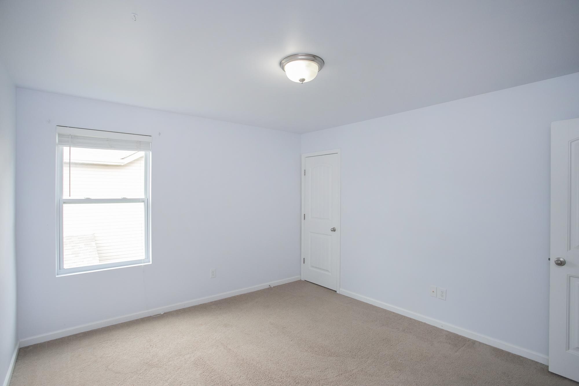 3601 Harpeth Springs Drive Nashville, TN 37221 - Photo 43 of 55 an empty room with a window