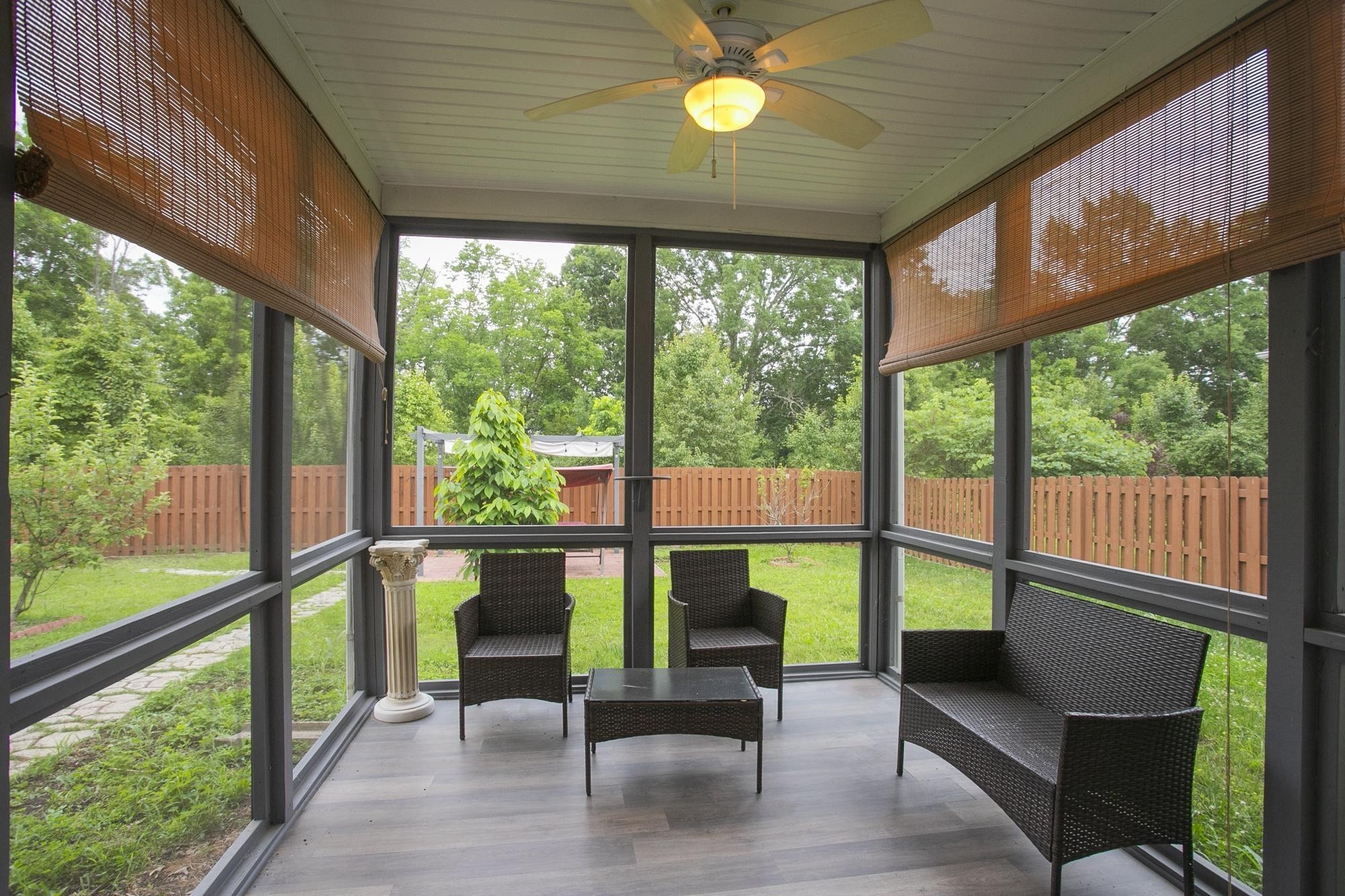 3601 Harpeth Springs Drive Nashville, TN 37221 - Photo 46 of 55 a view of a porch with chairs and backyard