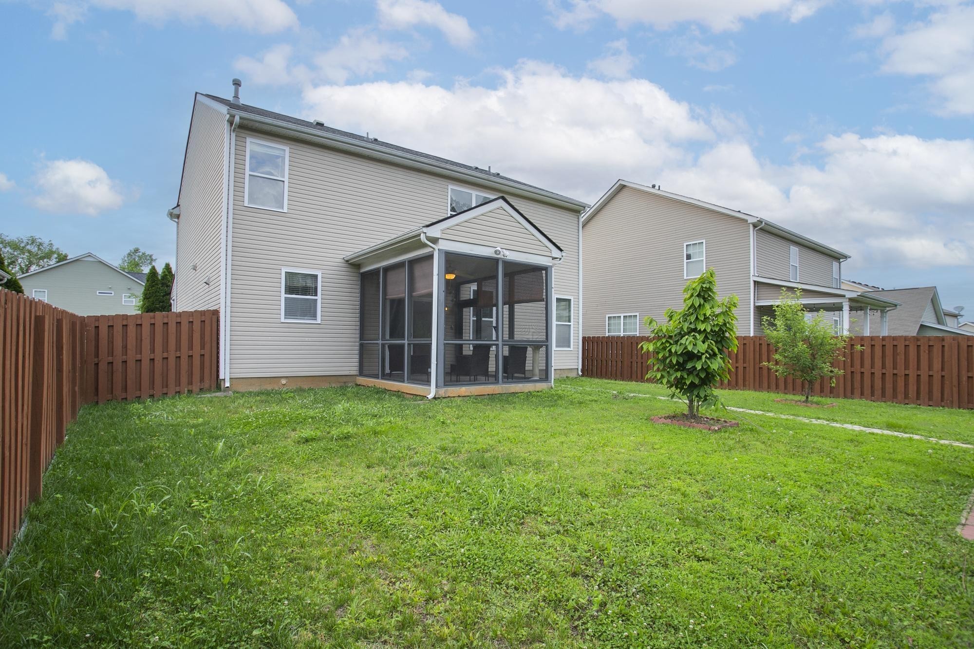 3601 Harpeth Springs Drive Nashville, TN 37221 - Photo 53 of 55 a view of a house with big yard and wooden fence