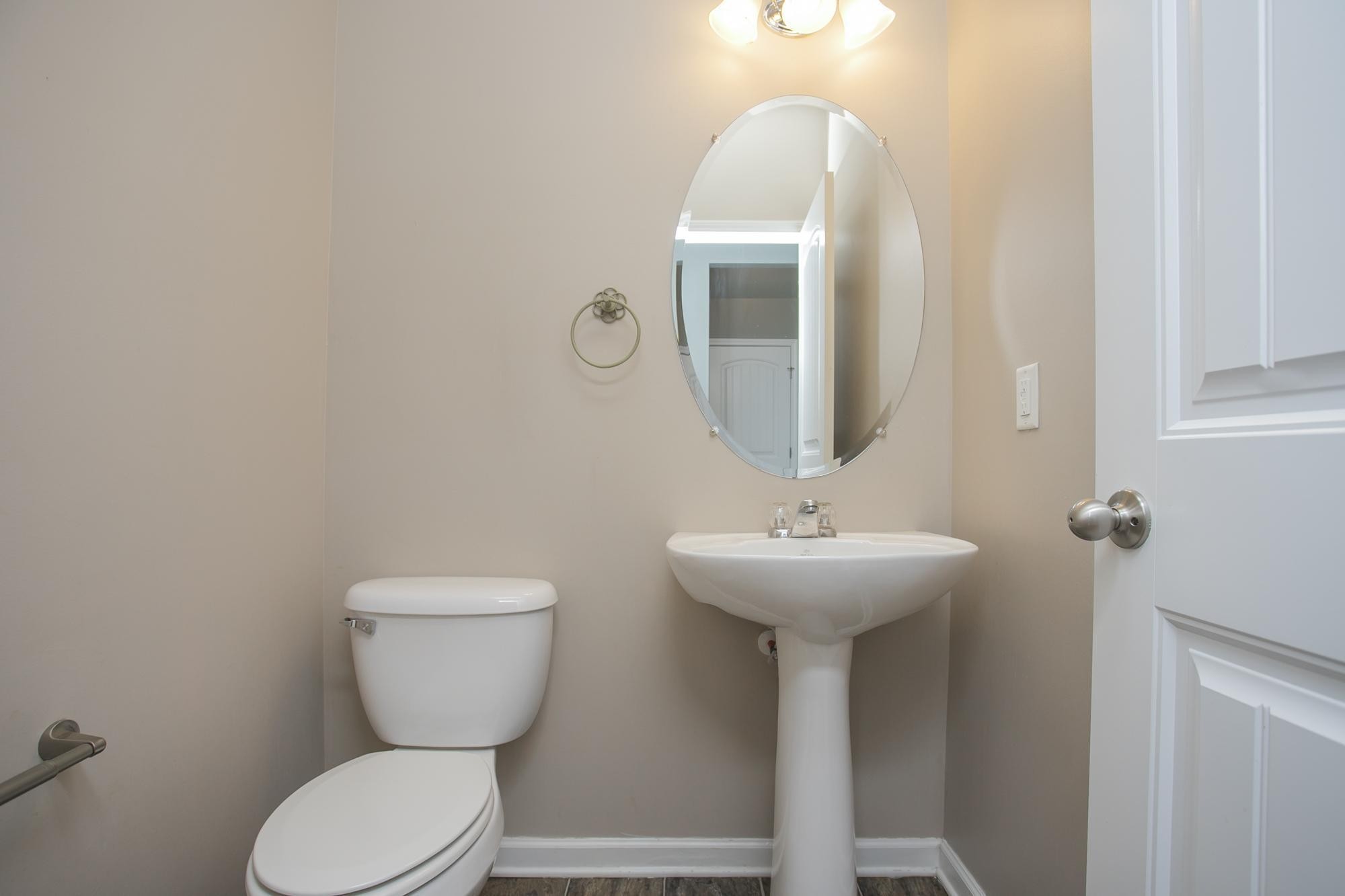 3601 Harpeth Springs Drive Nashville, TN 37221 - Photo 9 of 55 a bathroom with a toilet sink and mirror