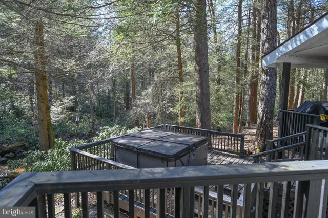 a view of a furniture and backyard from the balcony