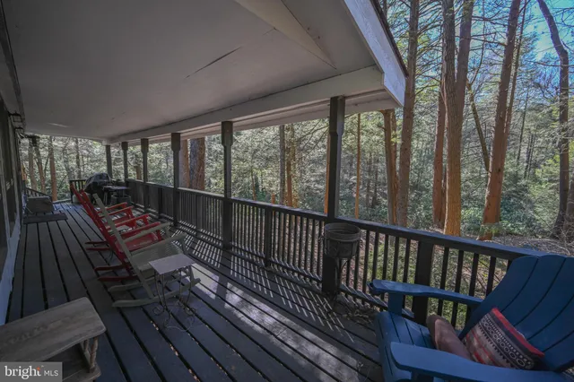 a balcony with wooden floor