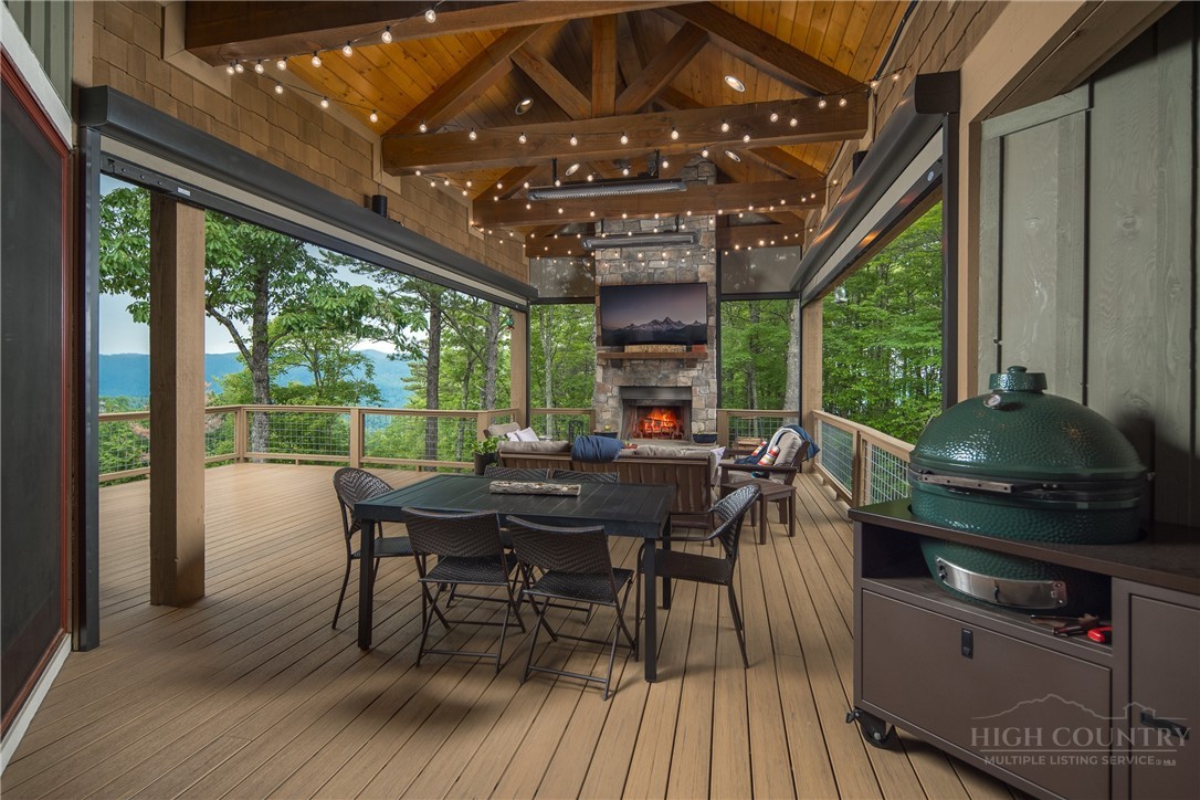 115 Passionflower Trail Boone, NC 28607 - Photo 11 of 50 a view of a dining room with furniture window and outside view