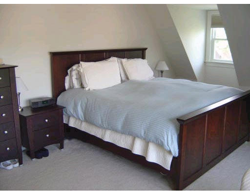 111 Sutherland Road, Unit 3A Boston, MA 02135 - Photo 6 of 9 a bedroom with a bed and window