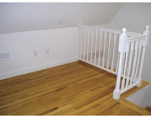 111 Sutherland Road, Unit 3A Boston, MA 02135 - Photo 7 of 9 a view of a room with wooden floor