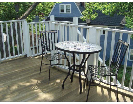 111 Sutherland Road, Unit 3A Boston, MA 02135 - Photo 9 of 9 a view of a chairs and table in the balcony