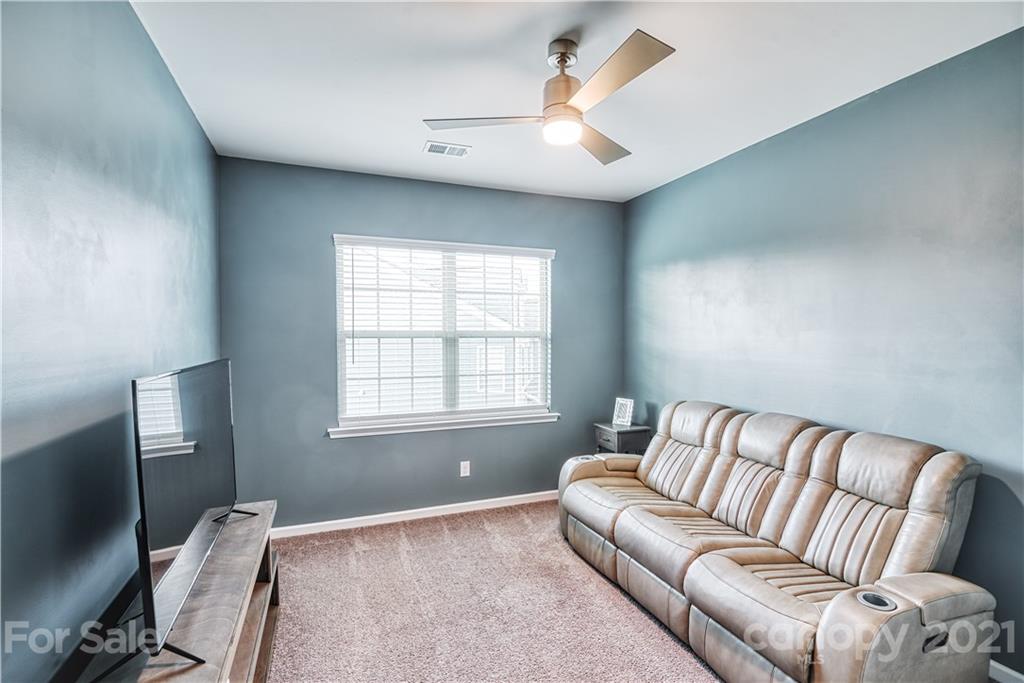 606 Amber Meadows Way Tega Cay, SC 29708 - Photo 17 of 23 a living room with furniture