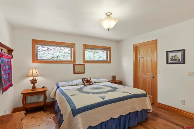 a bathroom with a sink a mirror and a window
