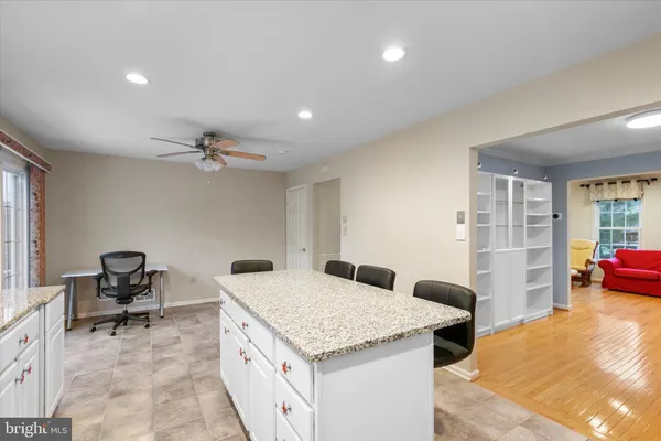 a kitchen with a stove and a refrigerator
