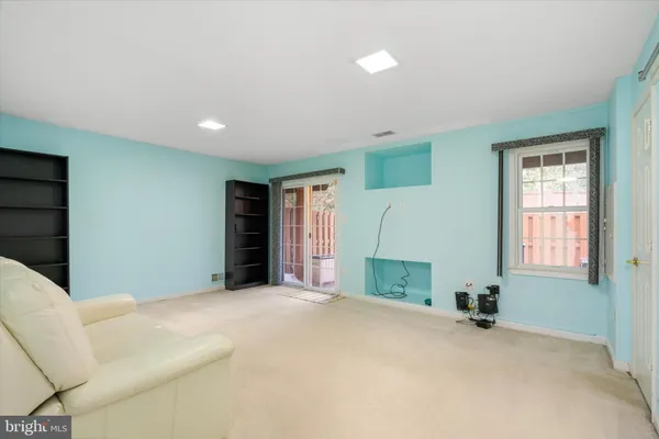 a bedroom with a bed and a fireplace