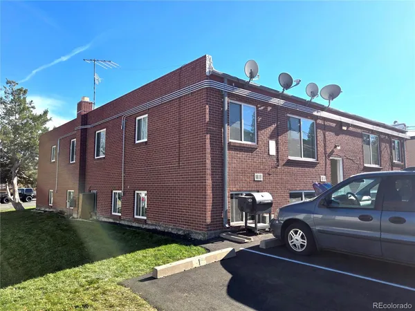 a view of hallway with wooden floor