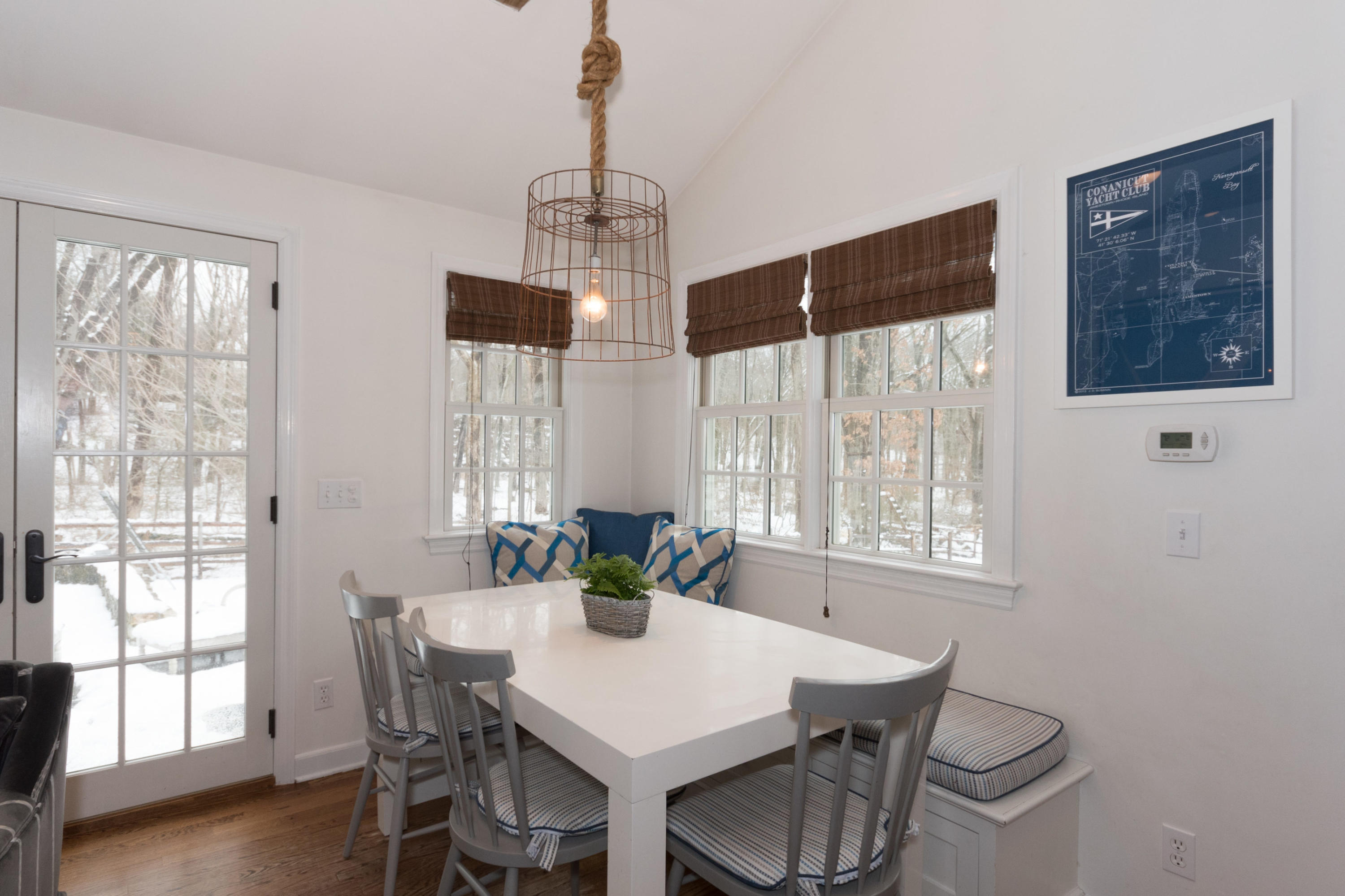 183 Smith Ridge Road New Canaan, CT 06840 - Photo 11 of 30 a view of a dining room with furniture window and outside view