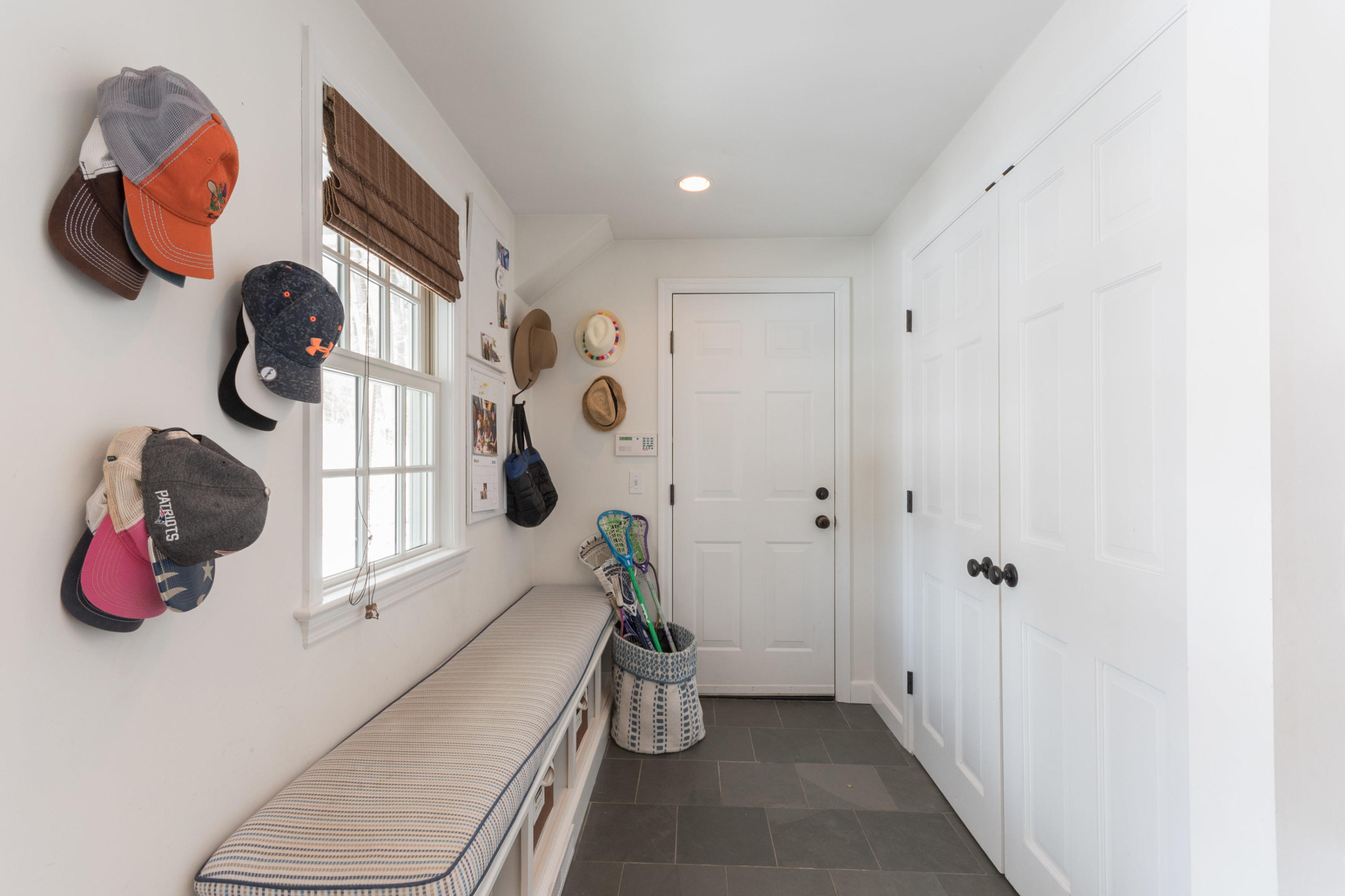 183 Smith Ridge Road New Canaan, CT 06840 - Photo 14 of 30 a bathroom with a sink and mirror with toilet