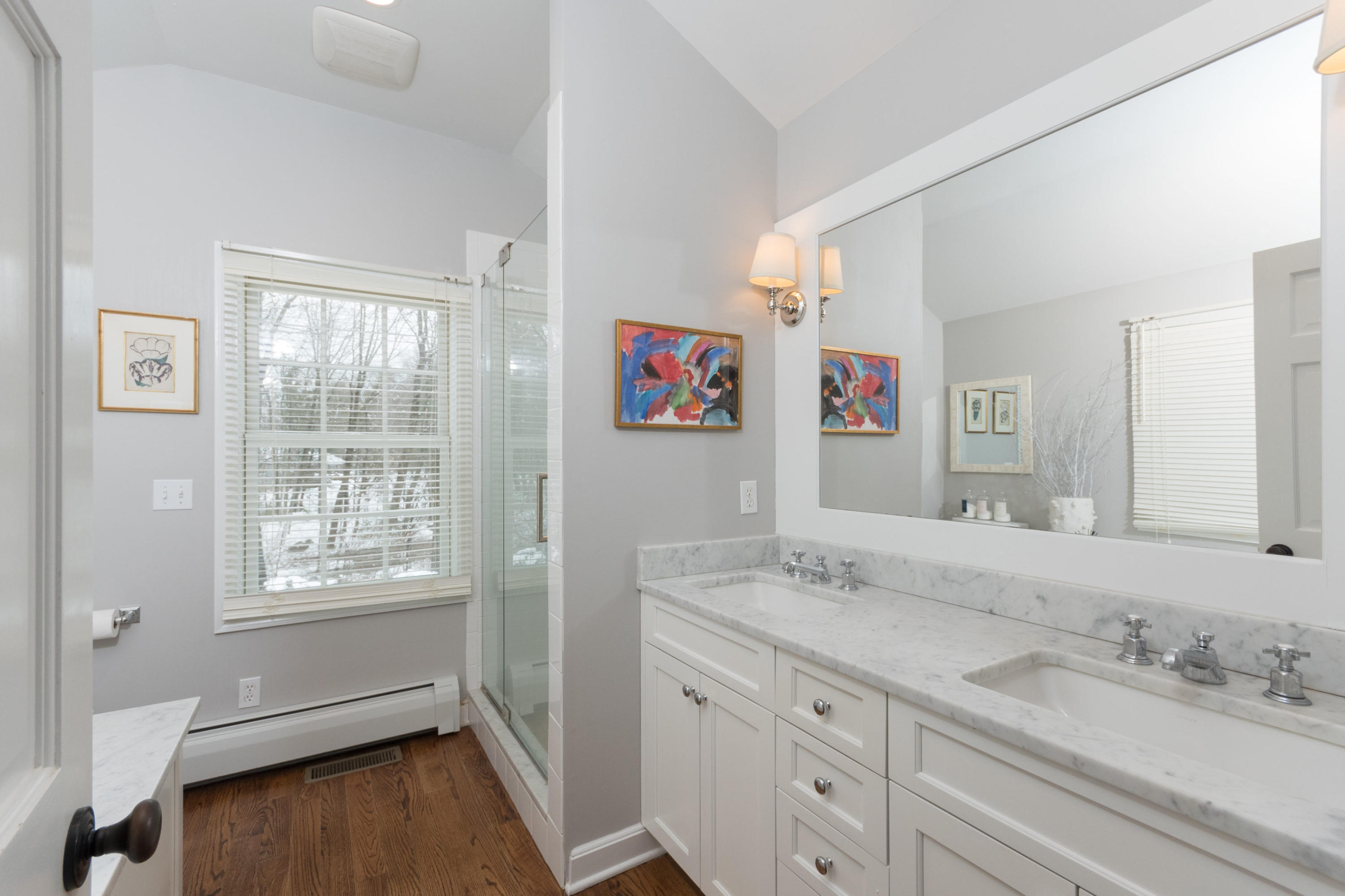 183 Smith Ridge Road New Canaan, CT 06840 - Photo 18 of 30 a bathroom with a granite countertop sink mirror and a window