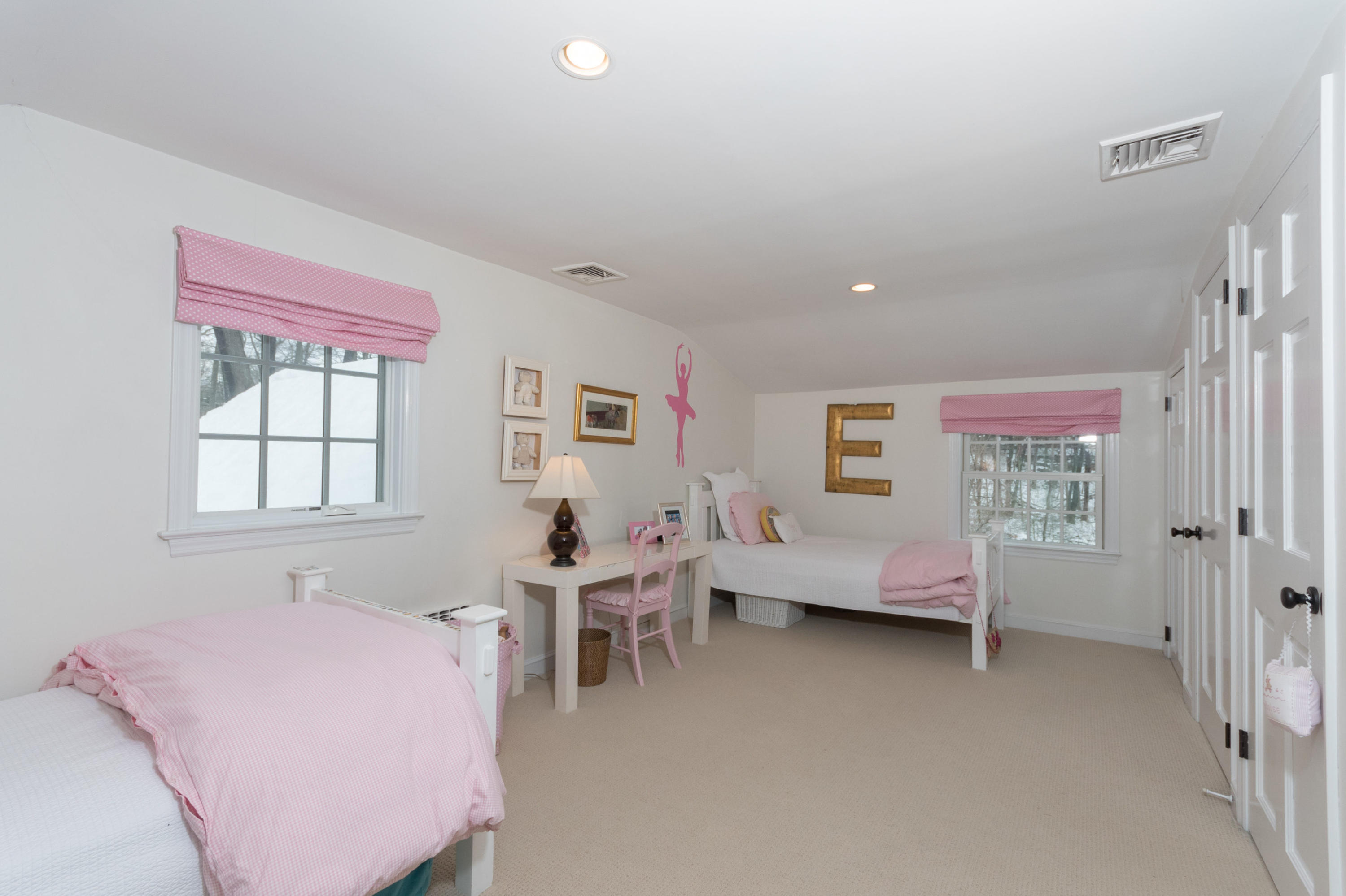 183 Smith Ridge Road New Canaan, CT 06840 - Photo 20 of 30 a bedroom with furniture and a window