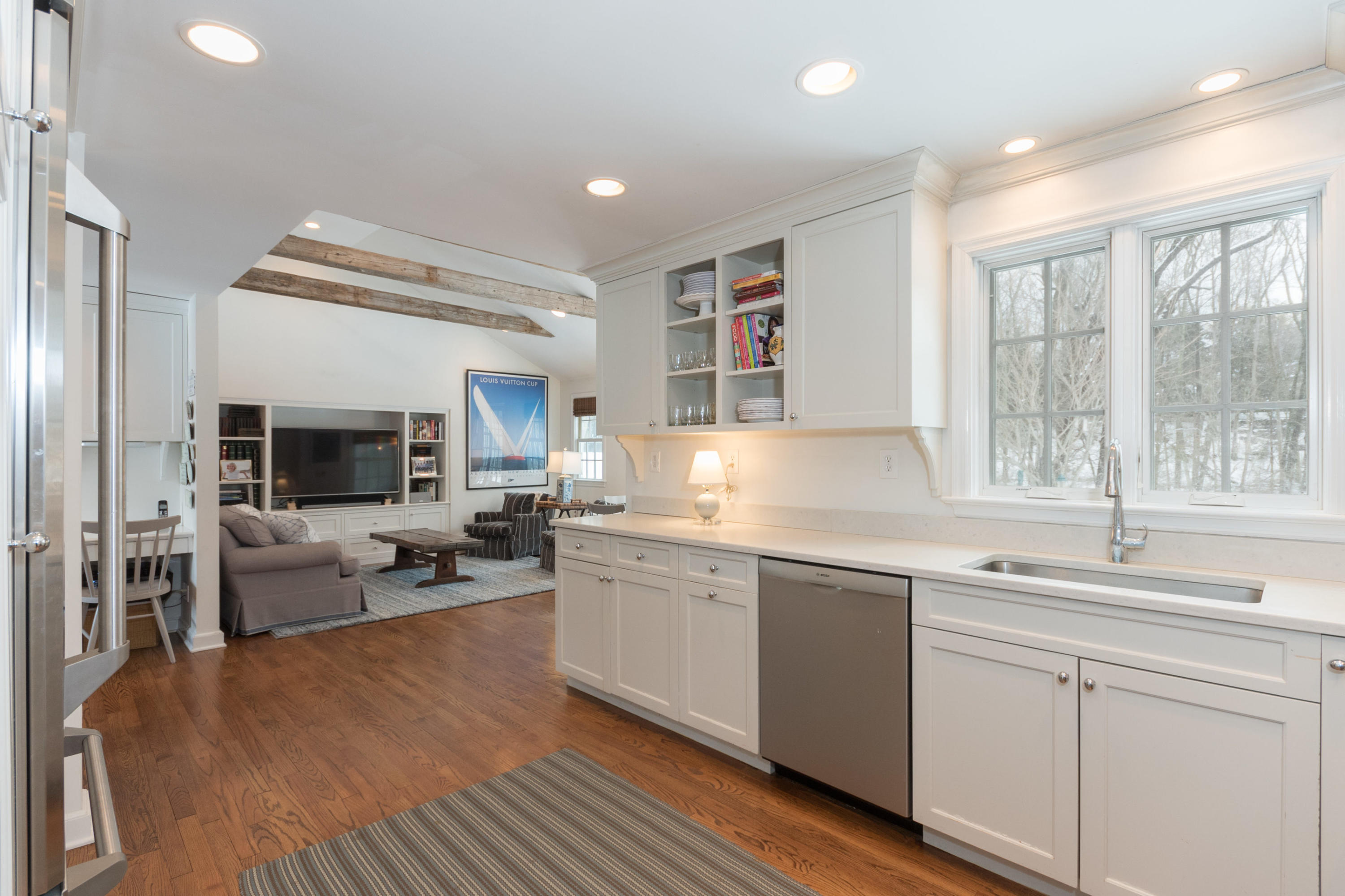 183 Smith Ridge Road New Canaan, CT 06840 - Photo 10 of 30 a kitchen with a sink stove and cabinets