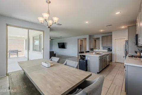 a spacious bathroom with a double vanity sink mirror and next to a window