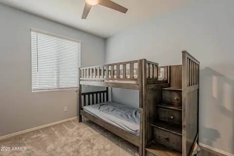 a en suite spacious bathroom with a double vanity sink and a mirror