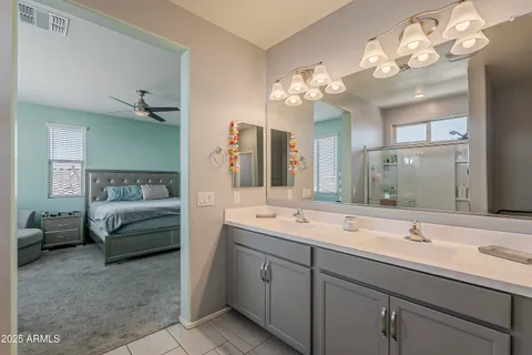 a front view of a house with swimming pool having outdoor seating