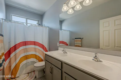 a view of a house with pool and a yard