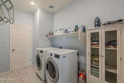 an aerial view of a residential apartment building with a yard