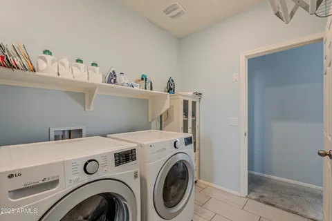 an aerial view of a house with a big yard