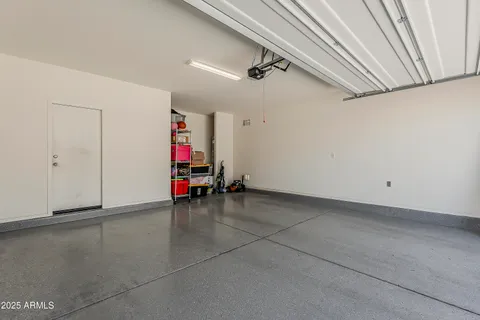 an aerial view of residential house and sandy dunes