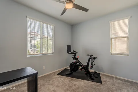 a bathroom with a sink toilet and mirror
