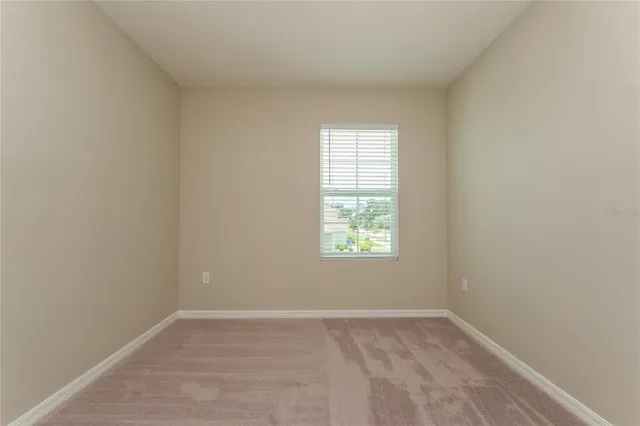 an empty room with a window