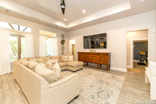 a large kitchen with stainless steel appliances kitchen island granite countertop a large counter top and stove in it