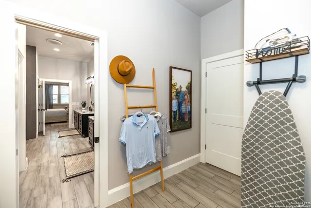 a kitchen with a stove a sink and a microwave