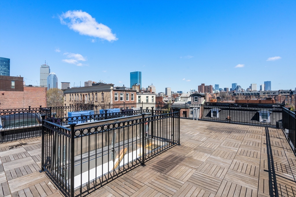 17 Worcester Street, Unit 9 Boston, MA 02118 - Photo 14 of 18 a view of a balcony with wooden floor