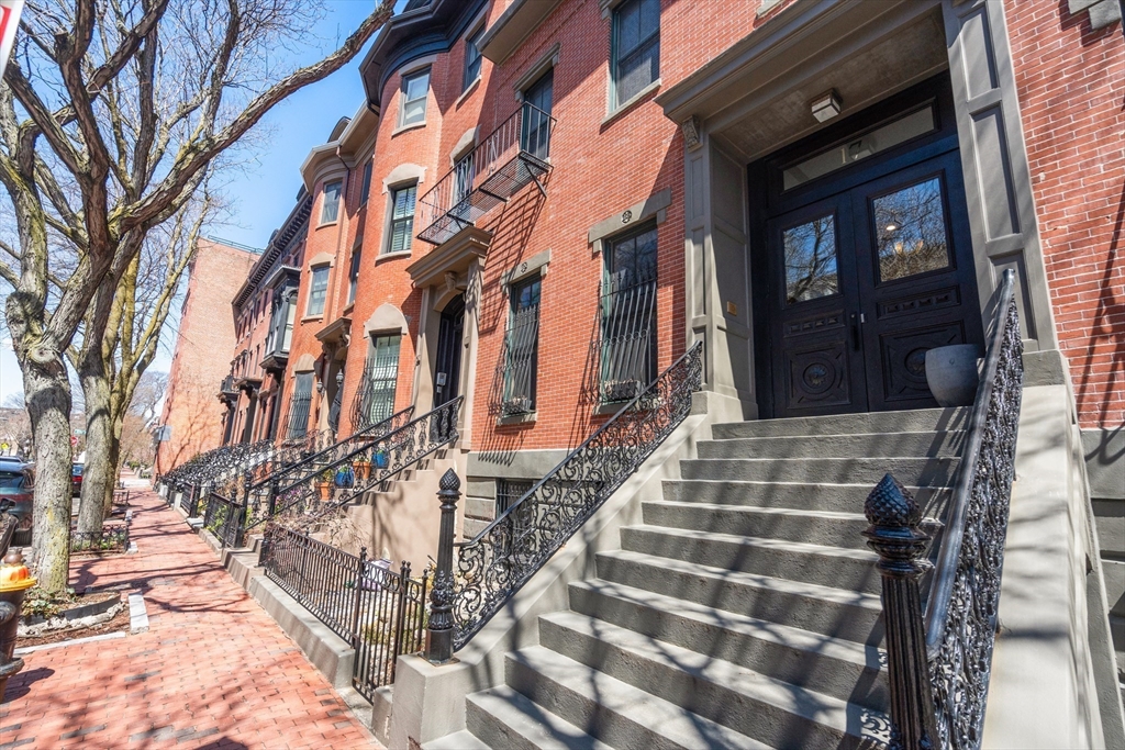 17 Worcester Street, Unit 9 Boston, MA 02118 - Photo 15 of 18 a view of a brick building with many windows