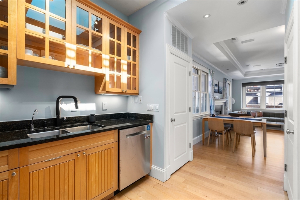 17 Worcester Street, Unit 9 Boston, MA 02118 - Photo 4 of 18 a kitchen with stainless steel appliances granite countertop a sink and cabinets