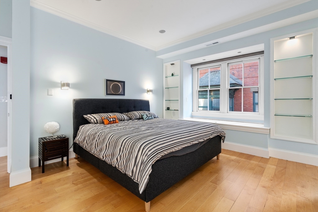 17 Worcester Street, Unit 9 Boston, MA 02118 - Photo 9 of 18 a bedroom with a bed and a window