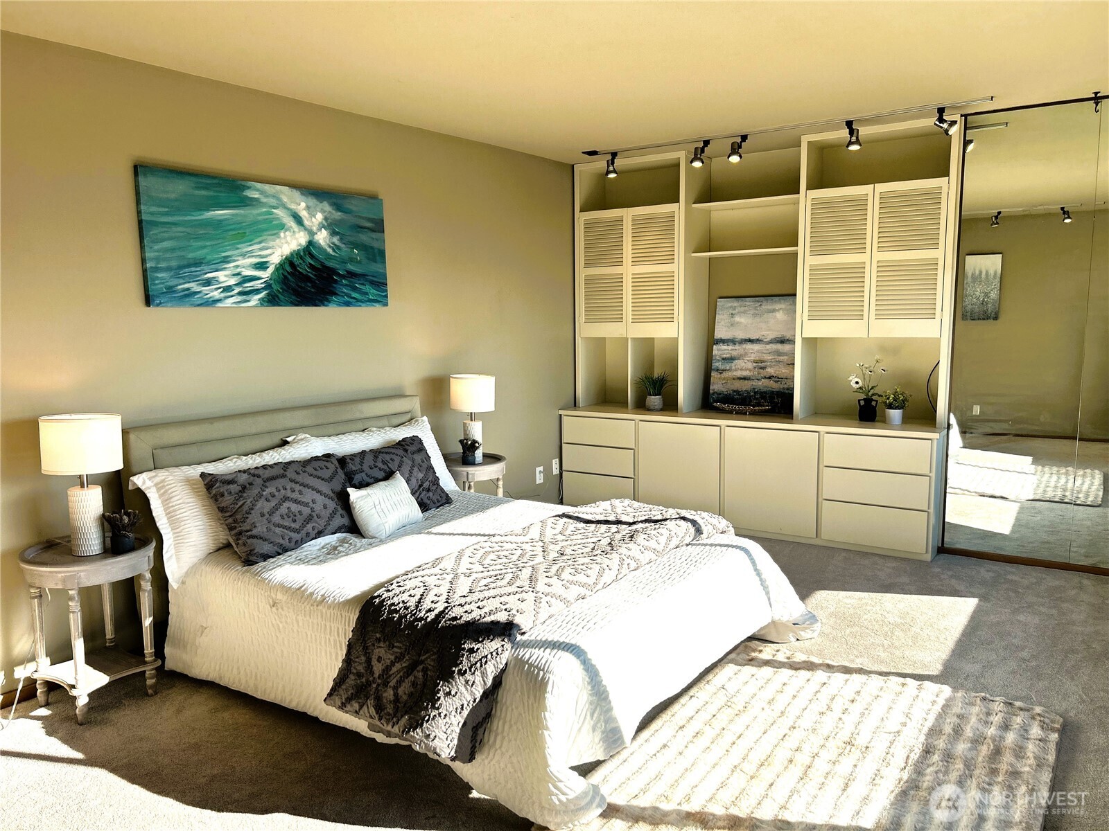 620 West Mercer Place, Unit 2B Seattle, WA 98119 - Photo 14 of 28 a bedroom with a bed and a night stand