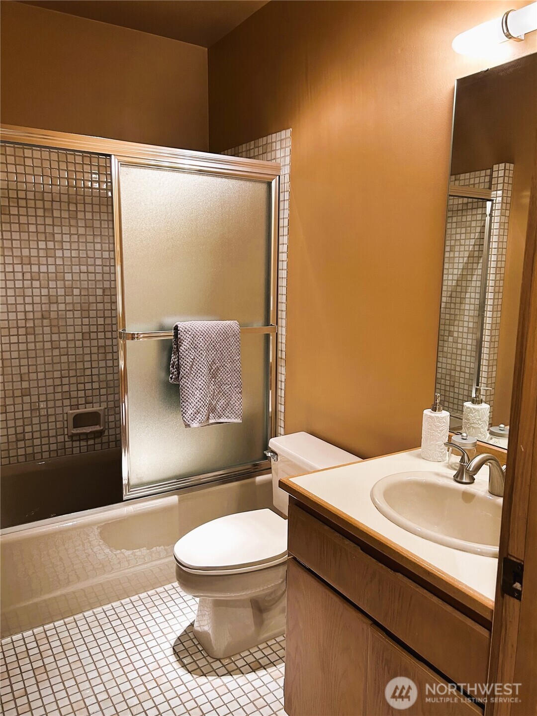 620 West Mercer Place, Unit 2B Seattle, WA 98119 - Photo 20 of 28 a bathroom with a sink toilet and shower