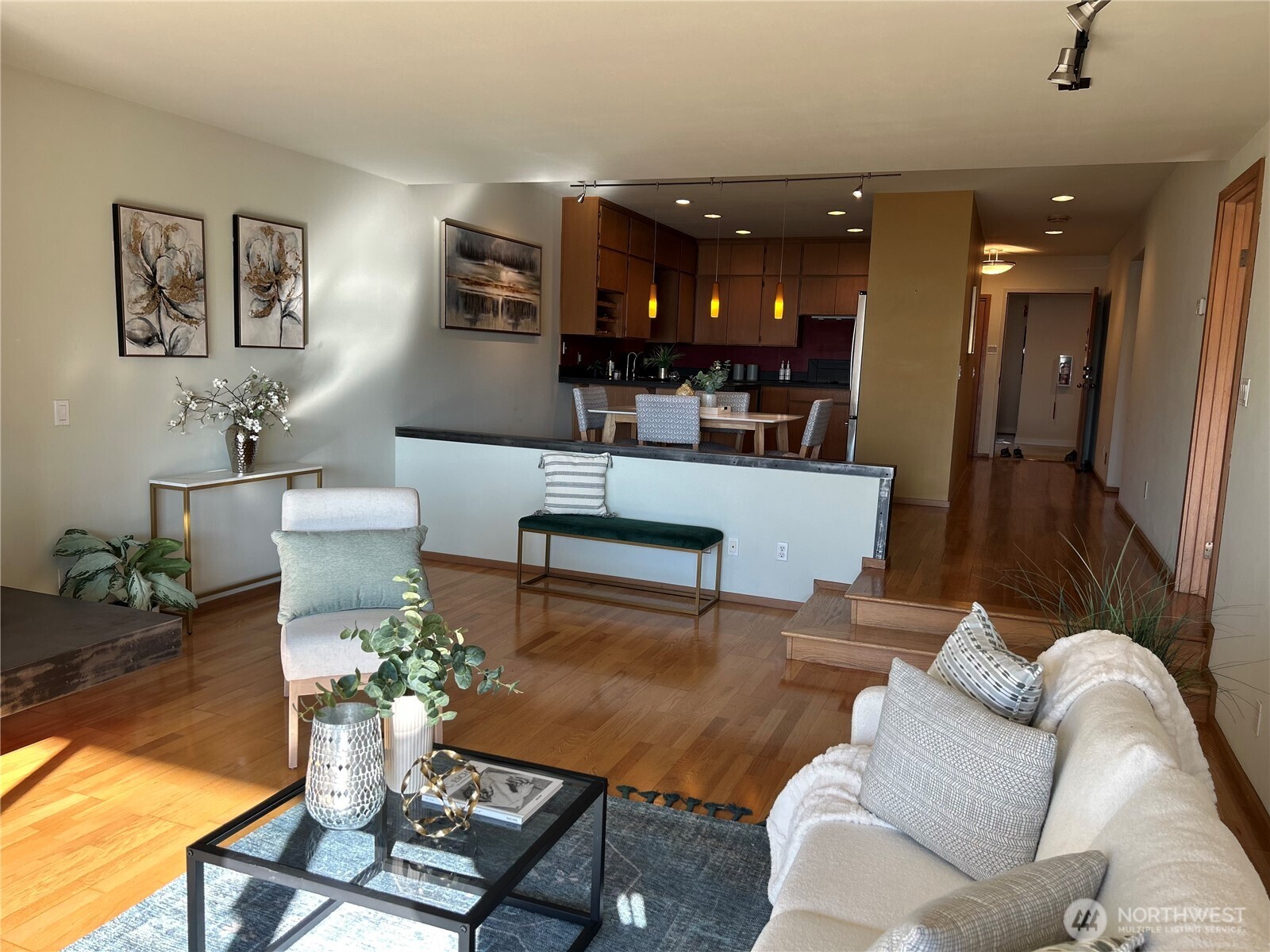620 West Mercer Place, Unit 2B Seattle, WA 98119 - Photo 4 of 28 a living room with furniture and a large window