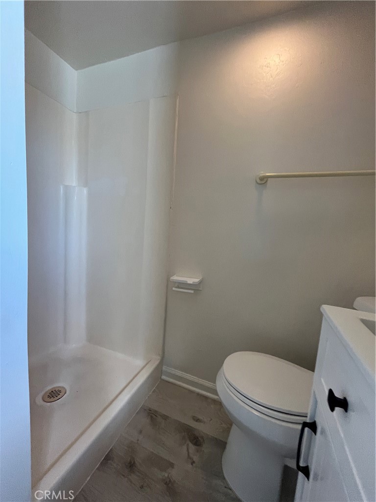 24601 1/2 Richman Drive Loma Linda, CA 92354 - Photo 12 of 13 a white toilet sitting next to a bath tub