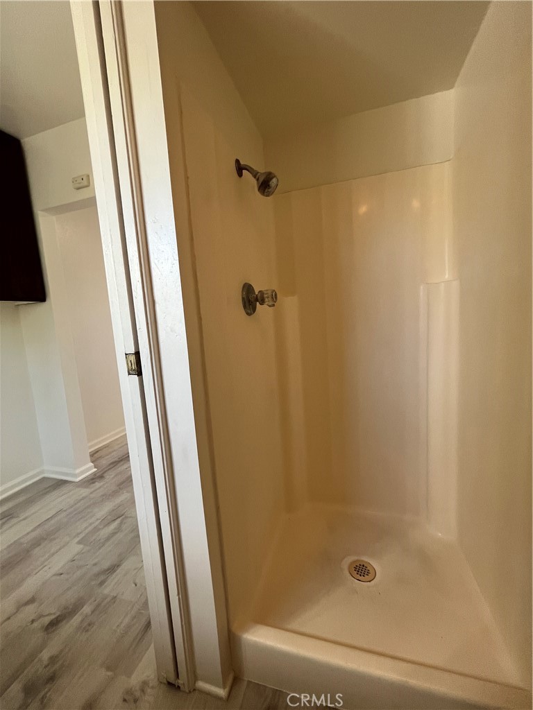 24601 1/2 Richman Drive Loma Linda, CA 92354 - Photo 13 of 13 a bathroom with a shower and a tub