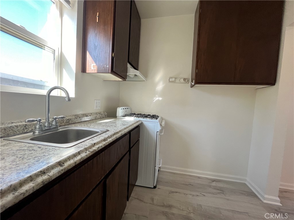 24601 1/2 Richman Drive Loma Linda, CA 92354 - Photo 7 of 13 a bathroom with a sink and a mirror