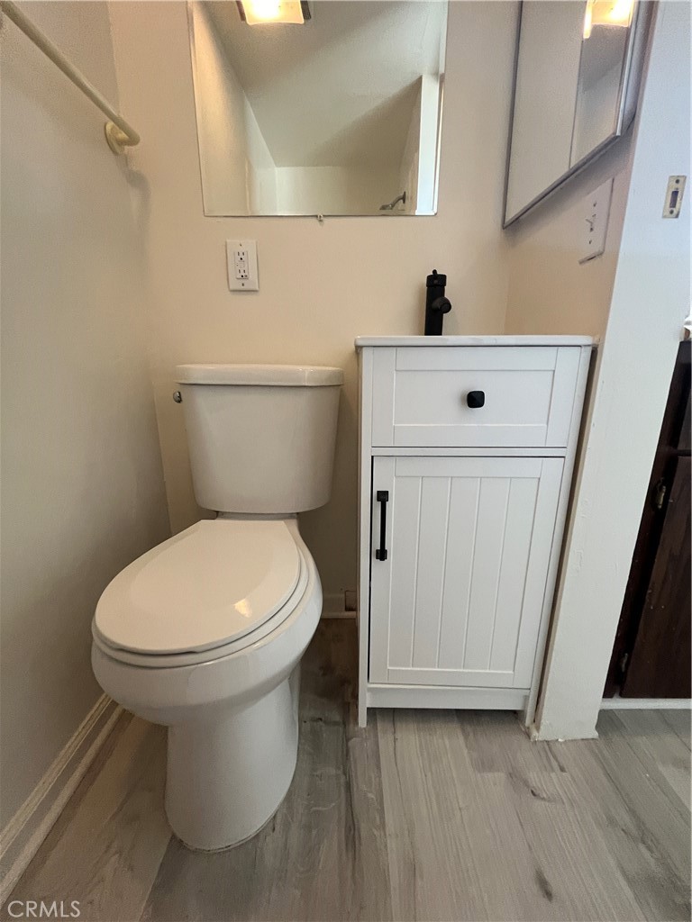 24601 1/2 Richman Drive Loma Linda, CA 92354 - Photo 10 of 13 a bathroom with a toilet and a sink