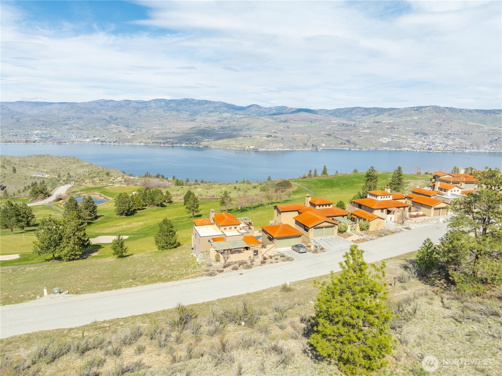 221 Bandera Way Chelan, WA 98816 - Photo 5 of 19 an aerial view of beach and residential houses with outdoor space