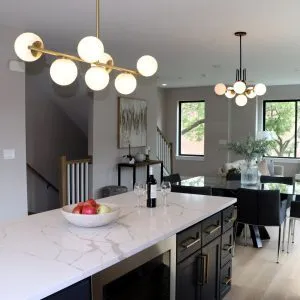 a view of a dining room and chandelier