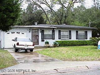10532 Stone Road Jacksonville, FL 32246 - Photo 1 of 1 a car parked in front of white house
