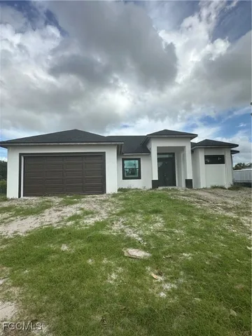 front view of house with a yard